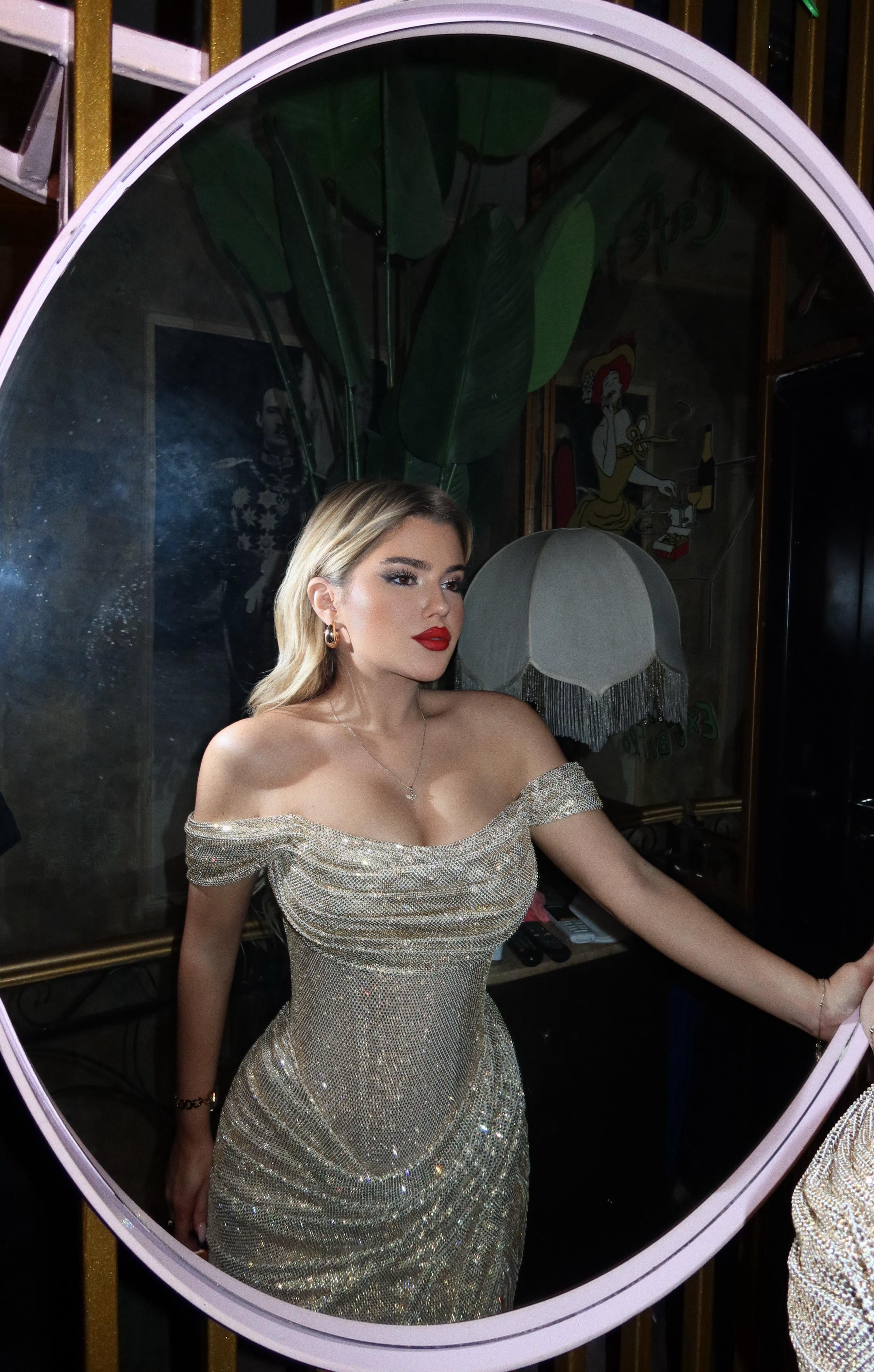MAGIC IN GOLD GOWN