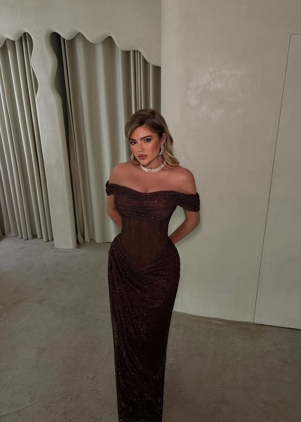 MAGIC IN BROWN GOWN