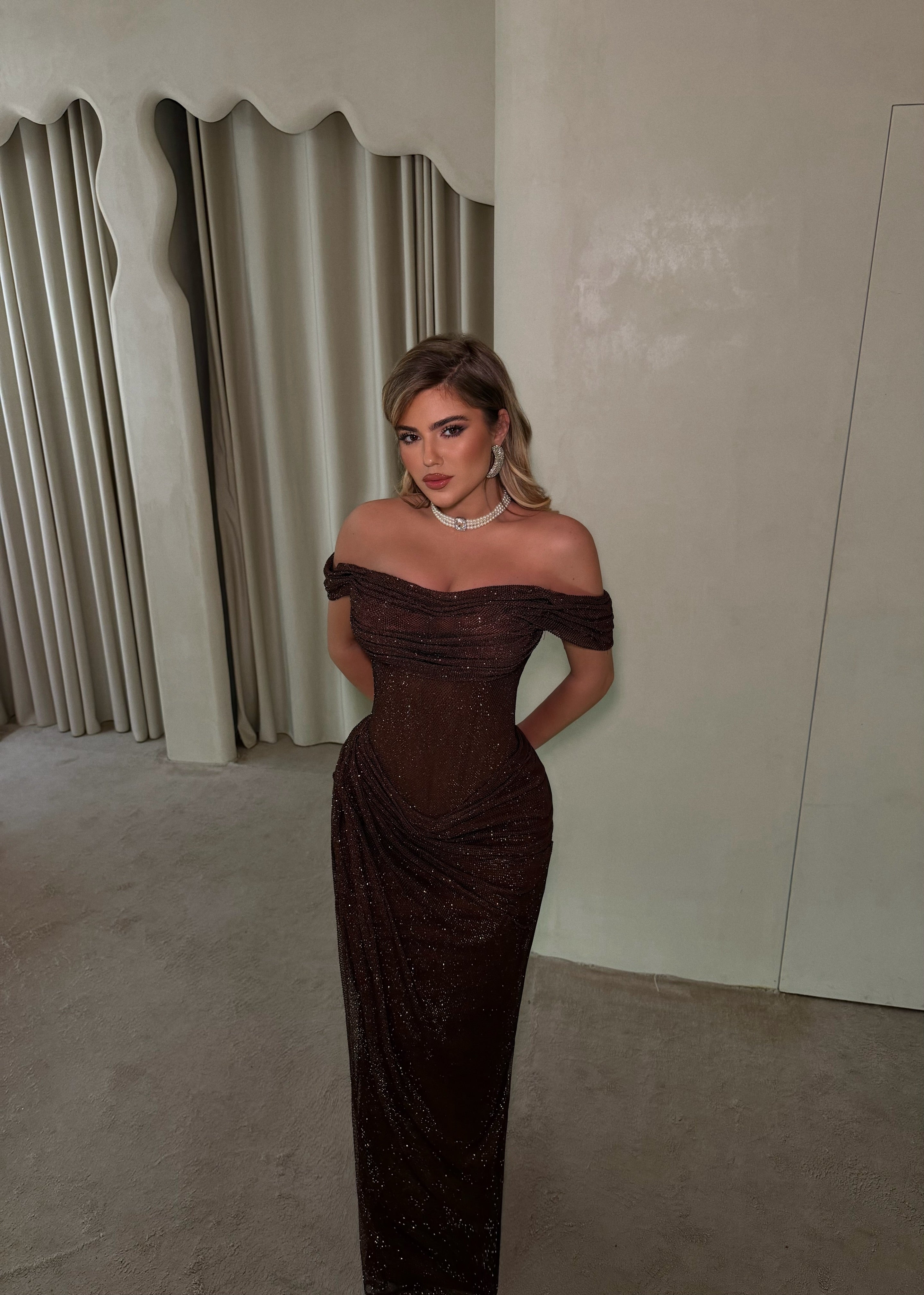 MAGIC IN BROWN GOWN